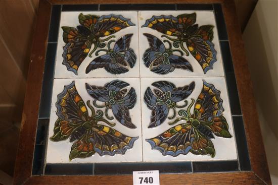 A mahogany Butterfly tile top table, W.41cm